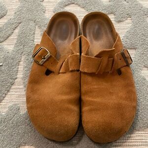 Practically new clogs. Size and brand unknown